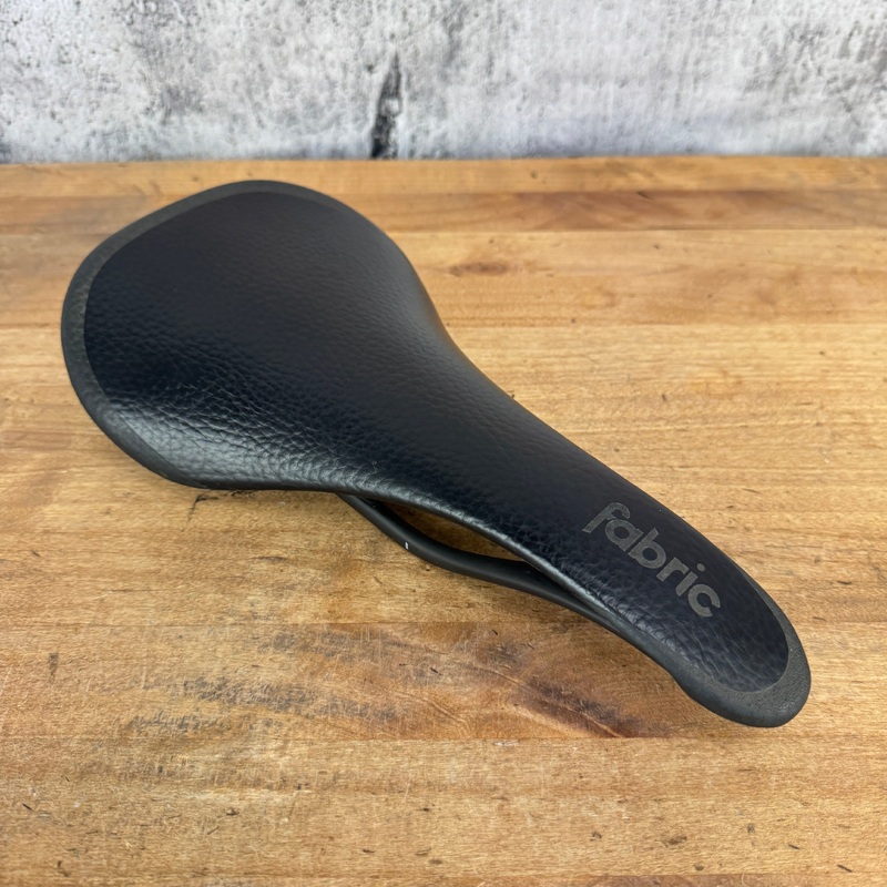 Fabric Airbus ALM Ultralight Carbon Leather 142mm 7x9mm Bike Saddle 130g